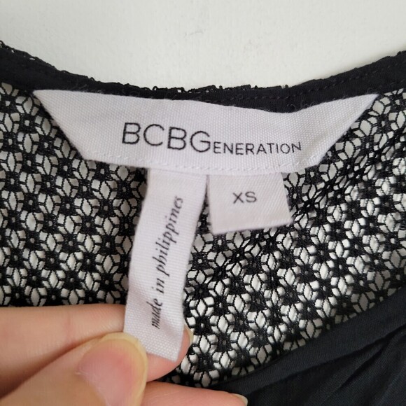BCBGeneration Black Mesh Back Asymmetric Muscle Sleeveless Tank Top Blouse Sz XS - Picture 8 of 9